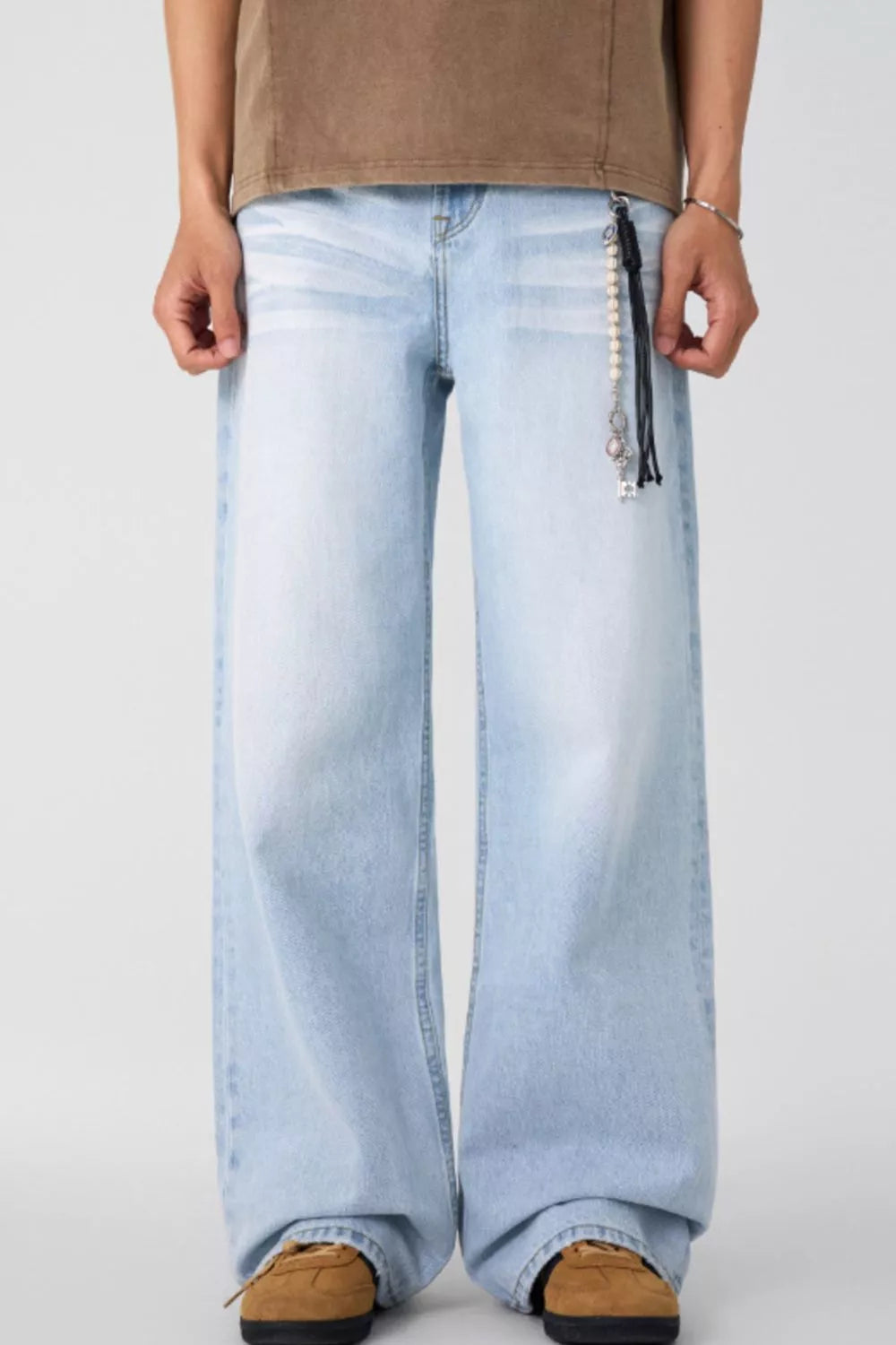 Wide-leg washed denim jeans, light blue relaxed fit, button fly