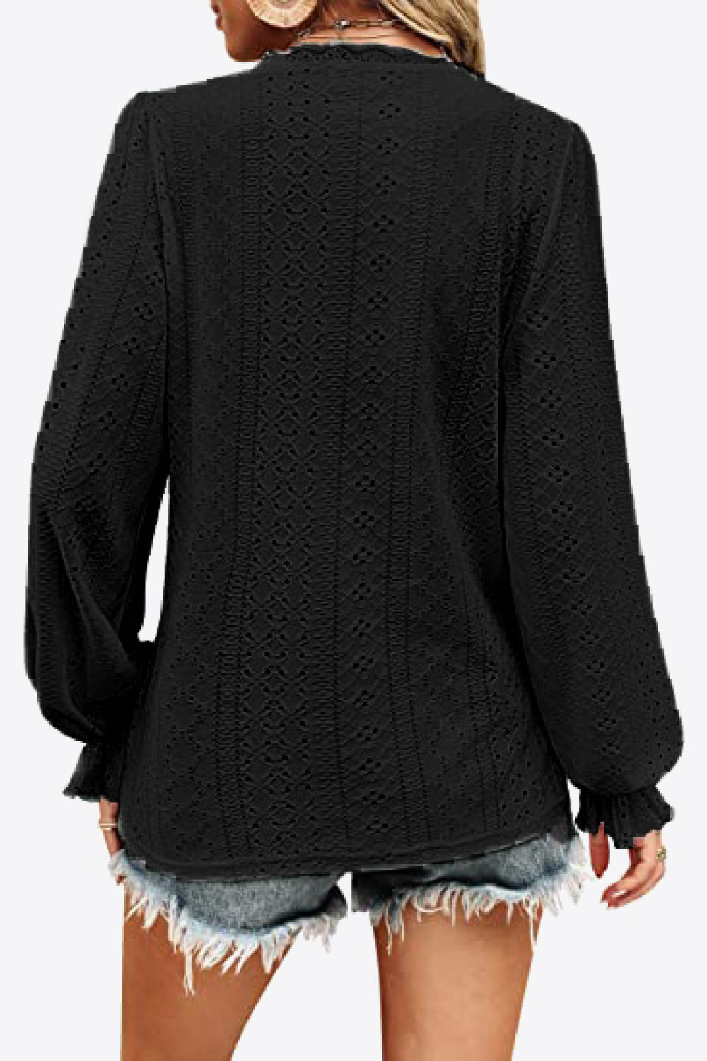 Black eyelet V-neck blouse with flounce sleeves