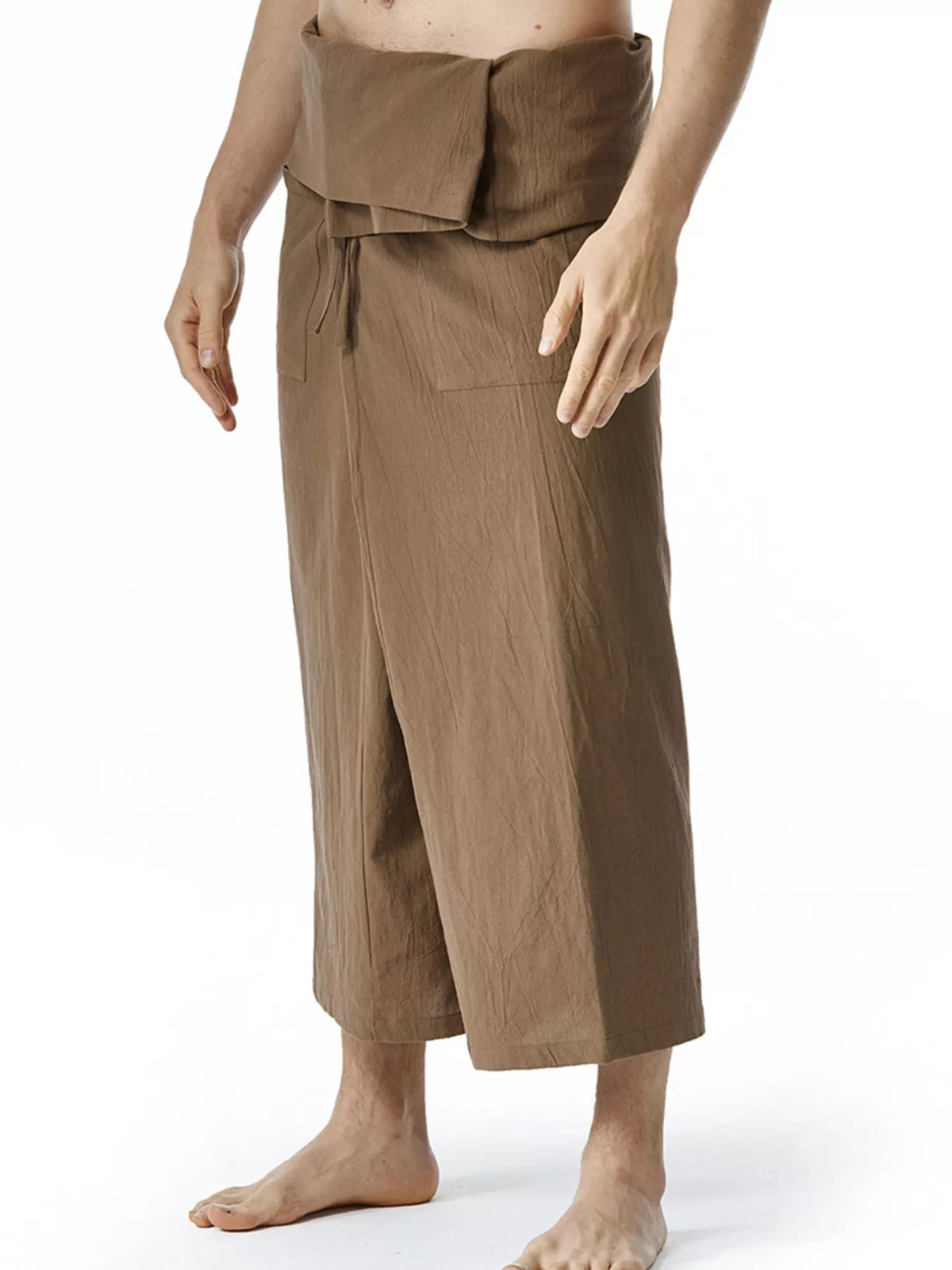 Men's loose-fit drawstring pants in medium brown, gathered elastic waist with dangling tie.