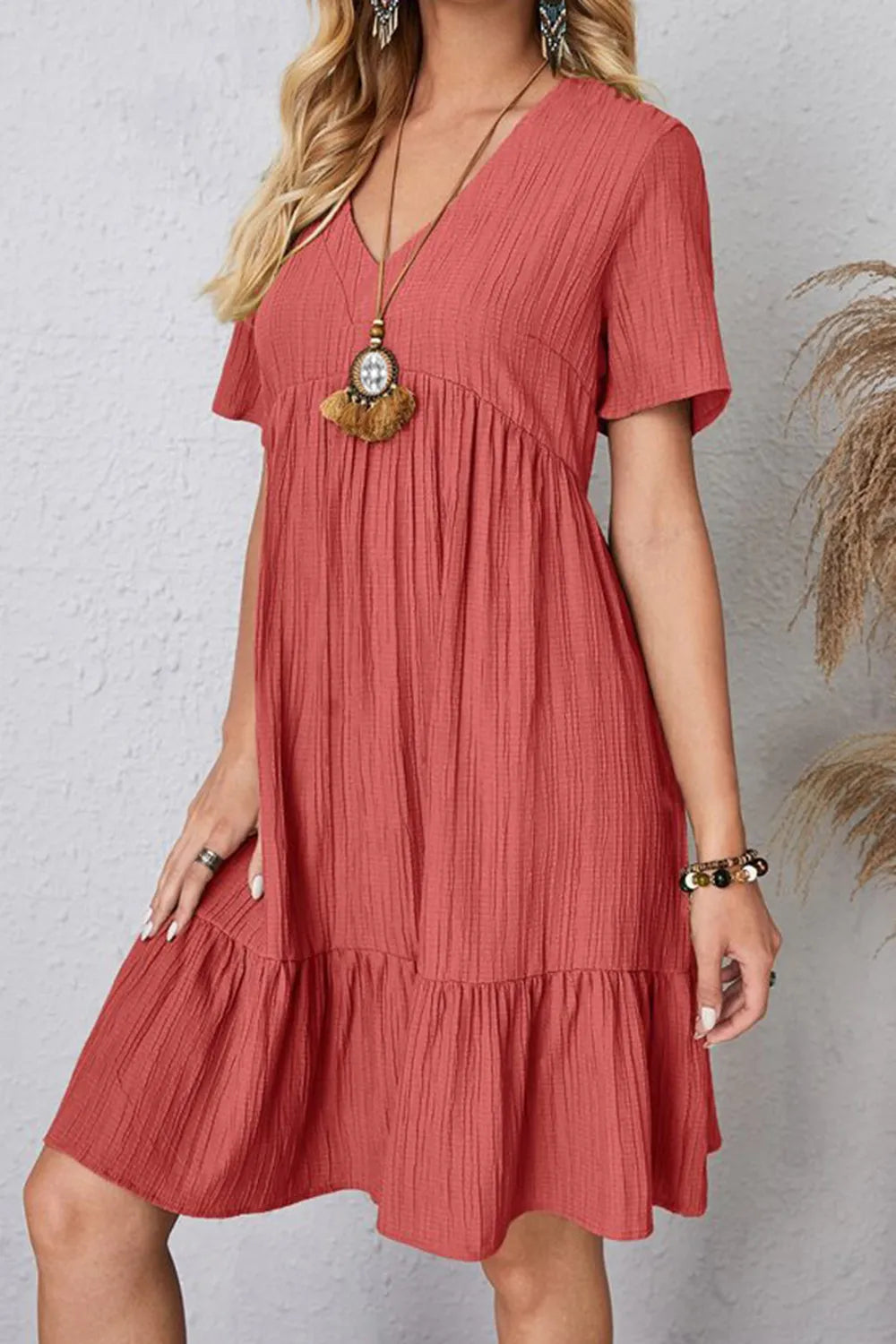 Coral ruched V-neck short-sleeve tiered dress with gathered waist