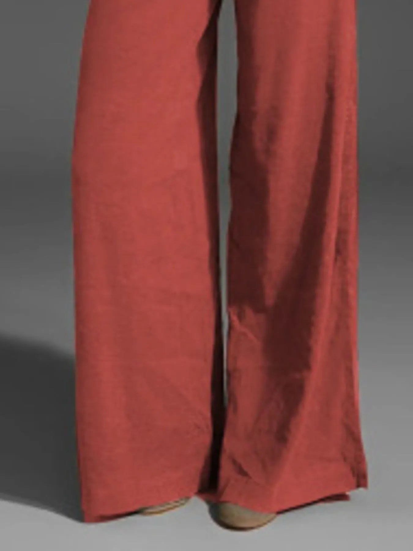 Red wide-leg pants with side pockets and button fly