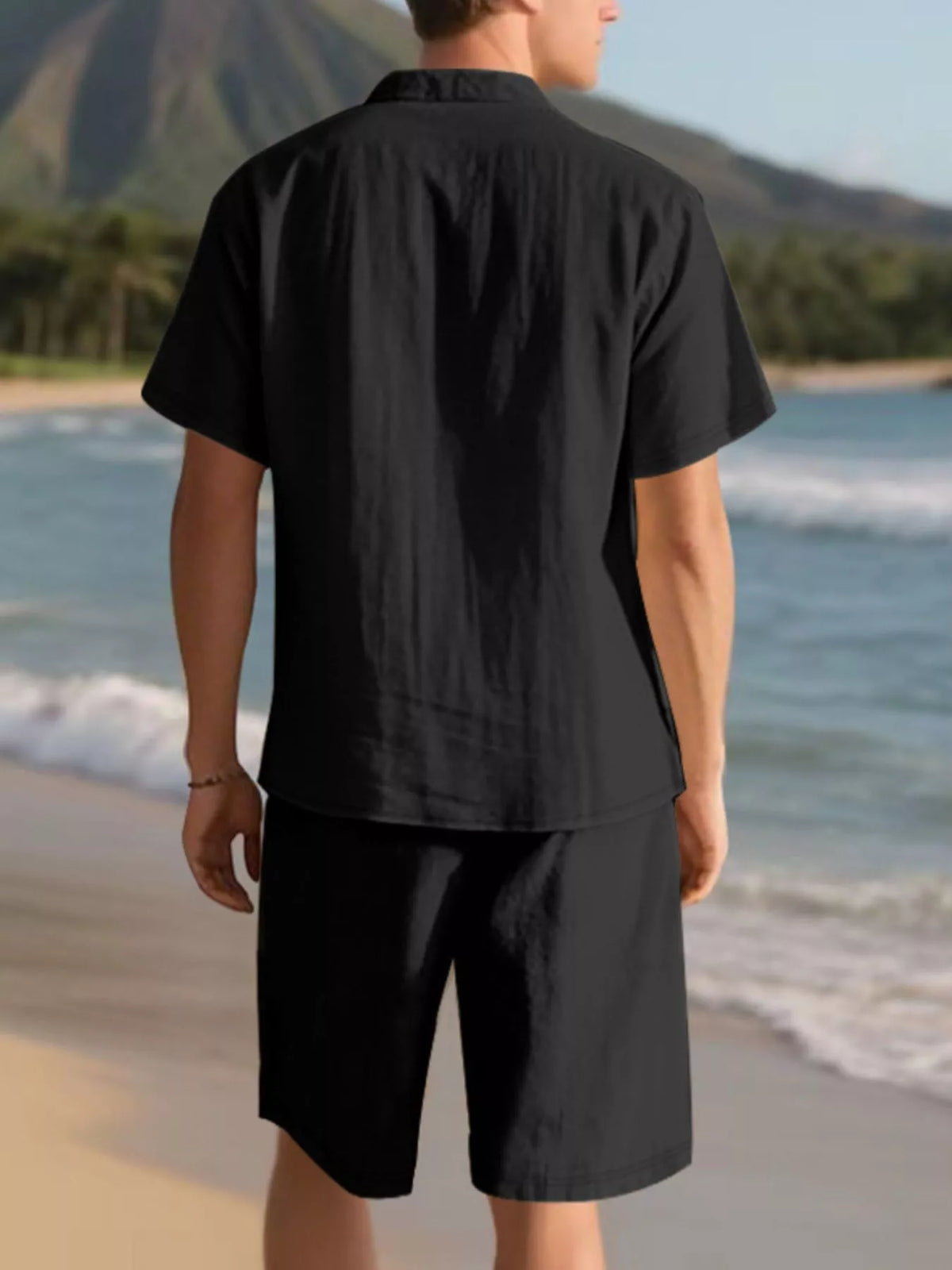 Men's black short-sleeve button-up shirt and matching shorts set, back view