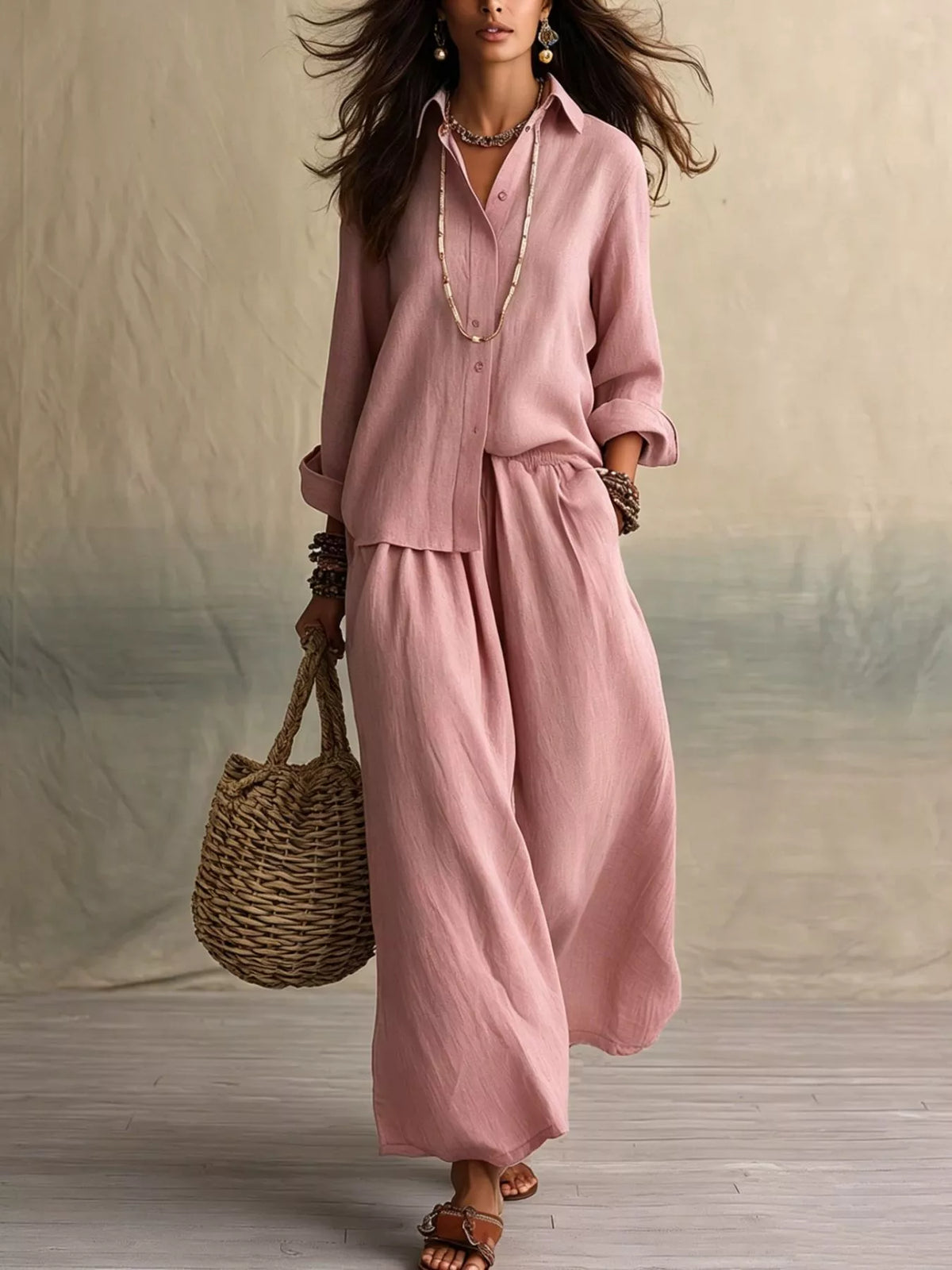 Pink button-up shirt and wide-leg pants set, long sleeves and relaxed fit