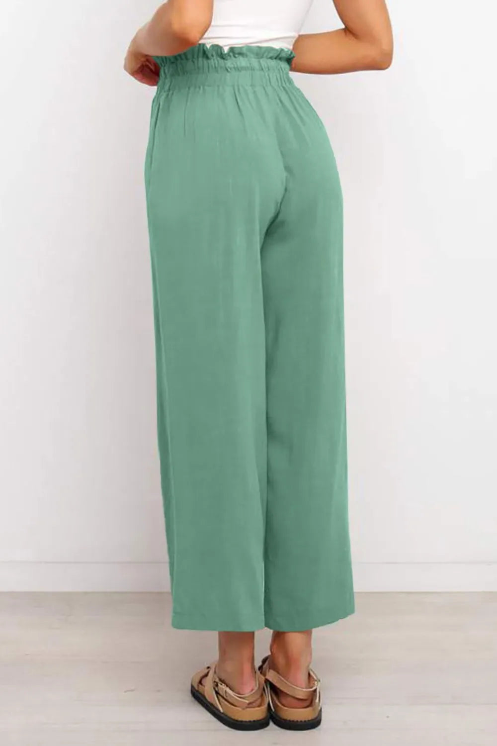 Green wide-leg pants with drawstring paperbag-style waist, back view