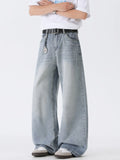 Washed wide-leg denim jeans with black belt, front pockets, relaxed fit