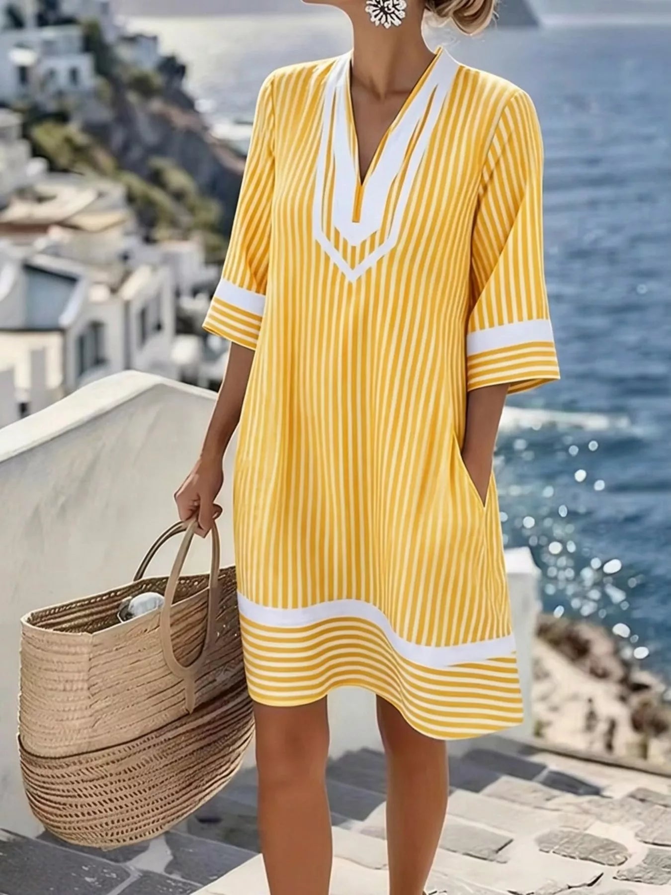 Striped V-neck casual dress in yellow and white, elbow sleeves, wavy hem band