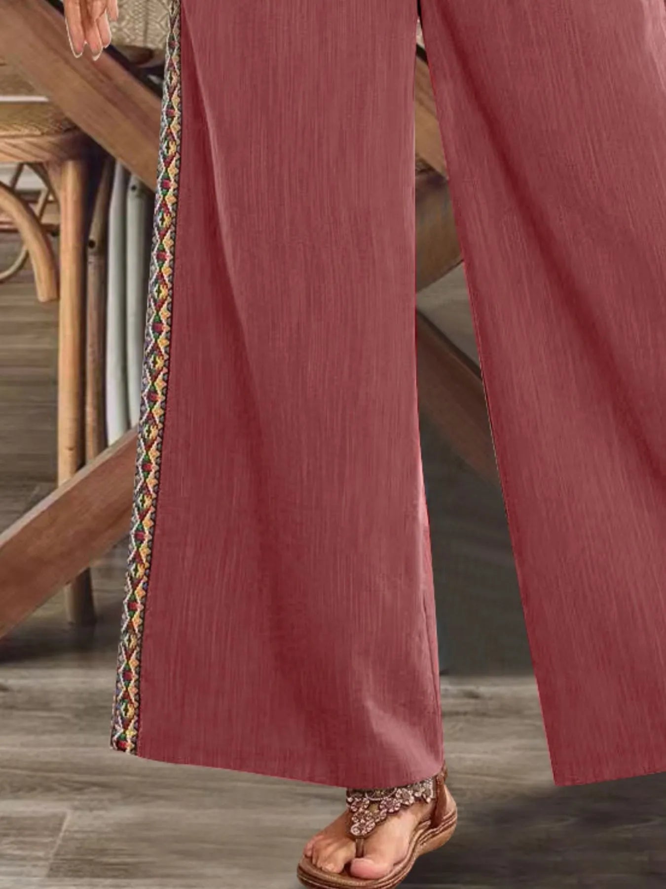 Dusty rose wide-leg pants with multicolor embroidered side stripe and wide hem
