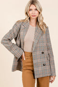 Brown plaid double-breasted blazer with notched lapels and long sleeves