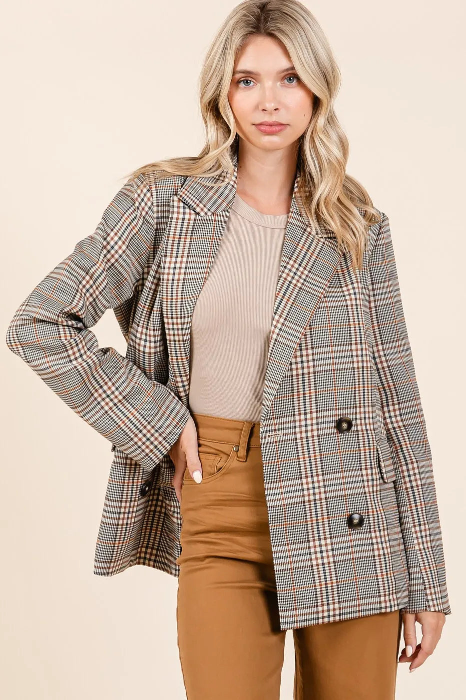 Brown plaid double-breasted blazer with notched lapels and long sleeves