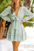Light green tied plunge smocked-waist flounce sleeve dress with bow at neckline