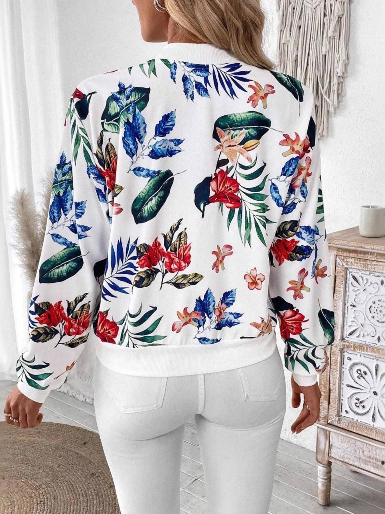 Floral zip-up long-sleeve jacket with multicolor leaf and flower print on white back