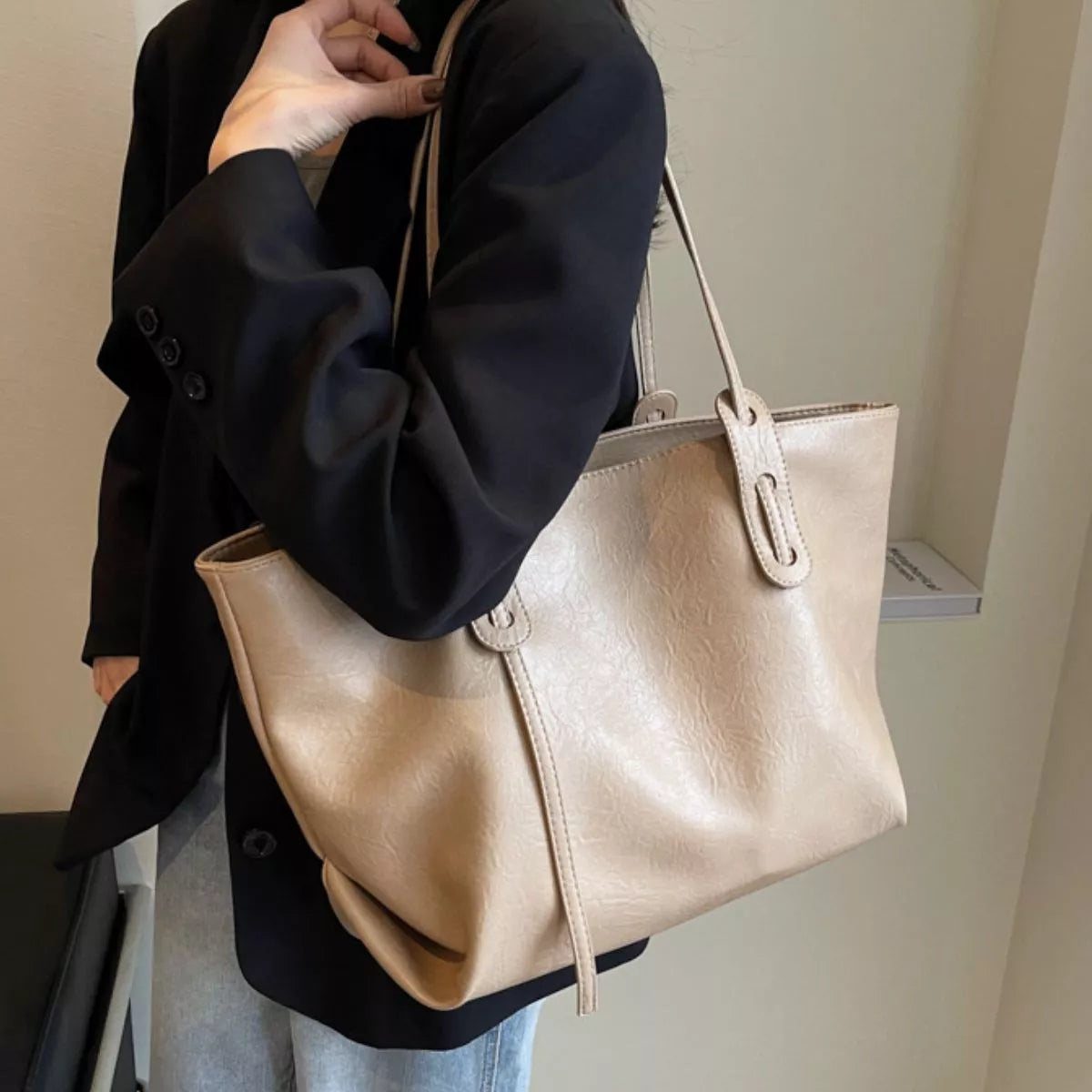 Khaki vegan leather shoulder bag tote with adjustable strap and center front zipper pull