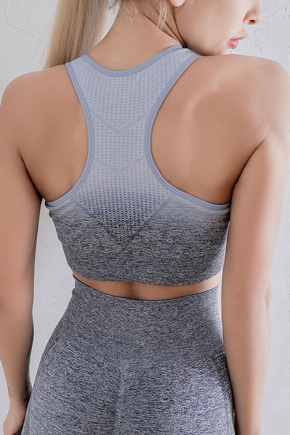 Sports bra and leggings set back view in grey with racerback sports bra