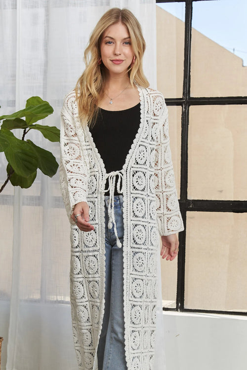 Ivory long-sleeve crochet cardigan with open front and square embroidered pattern