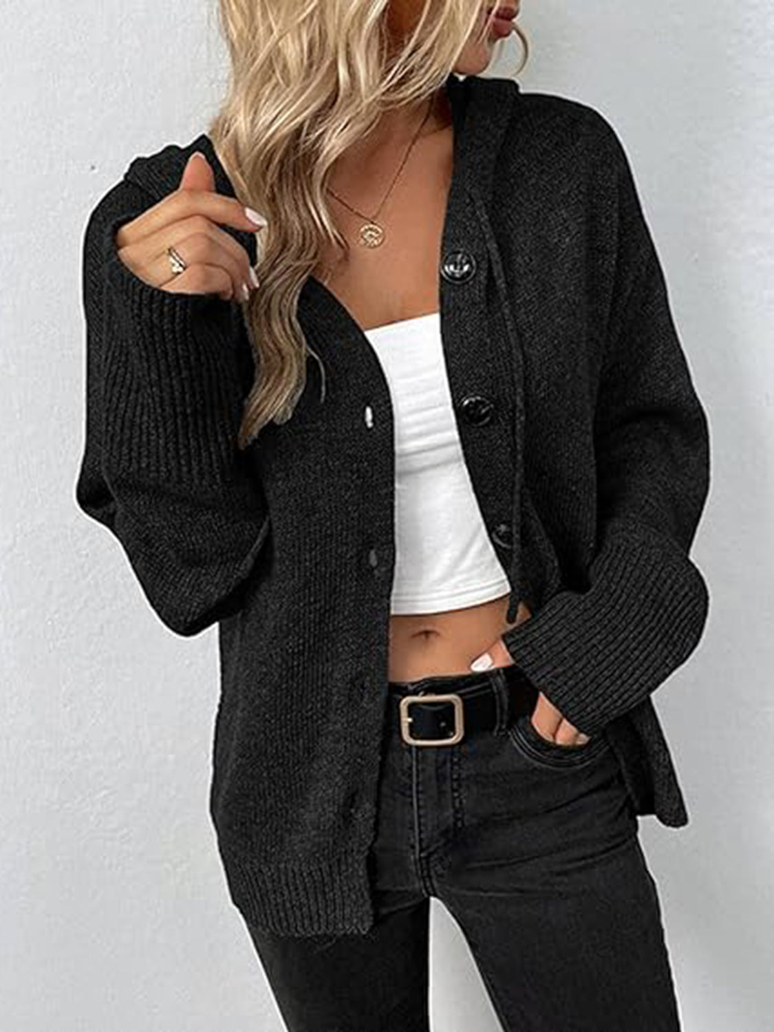 Black hooded button cardigan with long sleeves and ribbed cuffs
