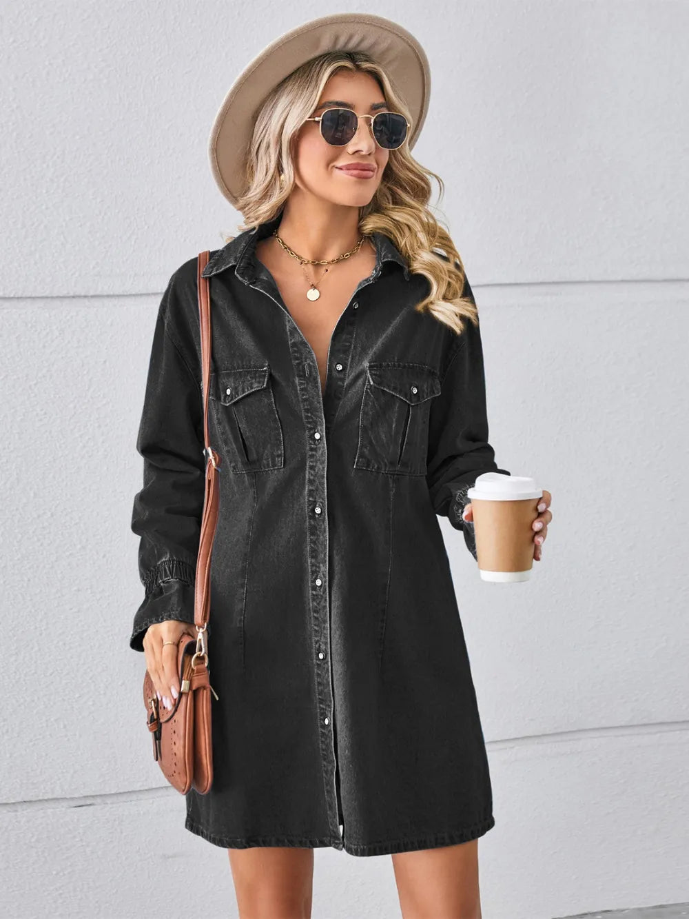 Black denim mini dress, dropped shoulders, button front, chest pockets, long sleeves