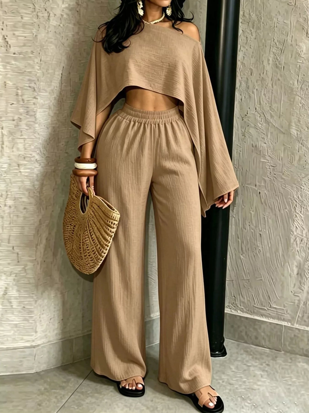 Beige boat-neck crop top and wide-leg pants set, loose cape sleeves