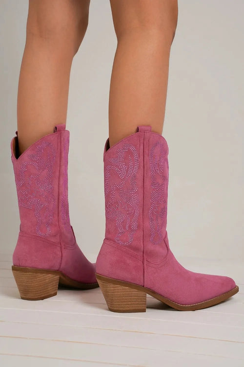 Cerise suede point-toe cowboy boots with rhinestone swirl details and block heel