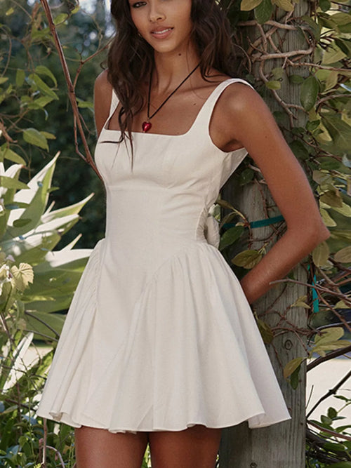 White backless mini dress with square neckline, sleeveless bodice and flared skirt