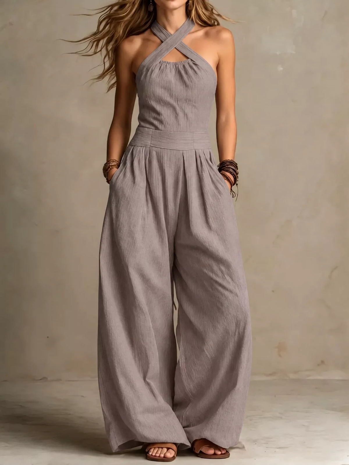 Light gray halter linen jumpsuit with high waist, gathered bodice, wide-leg pants