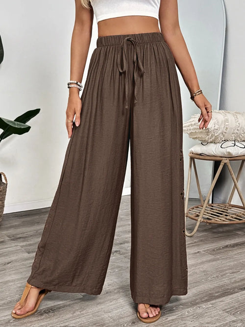 Dark brown wide-leg pants with elastic waist and drawstring