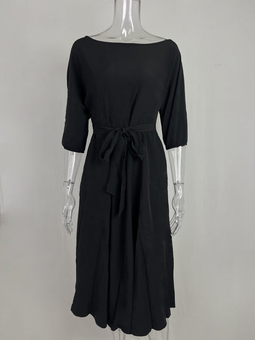 Black boat-neck tie-waist midi dress with bow-tie waist and three-quarter sleeves