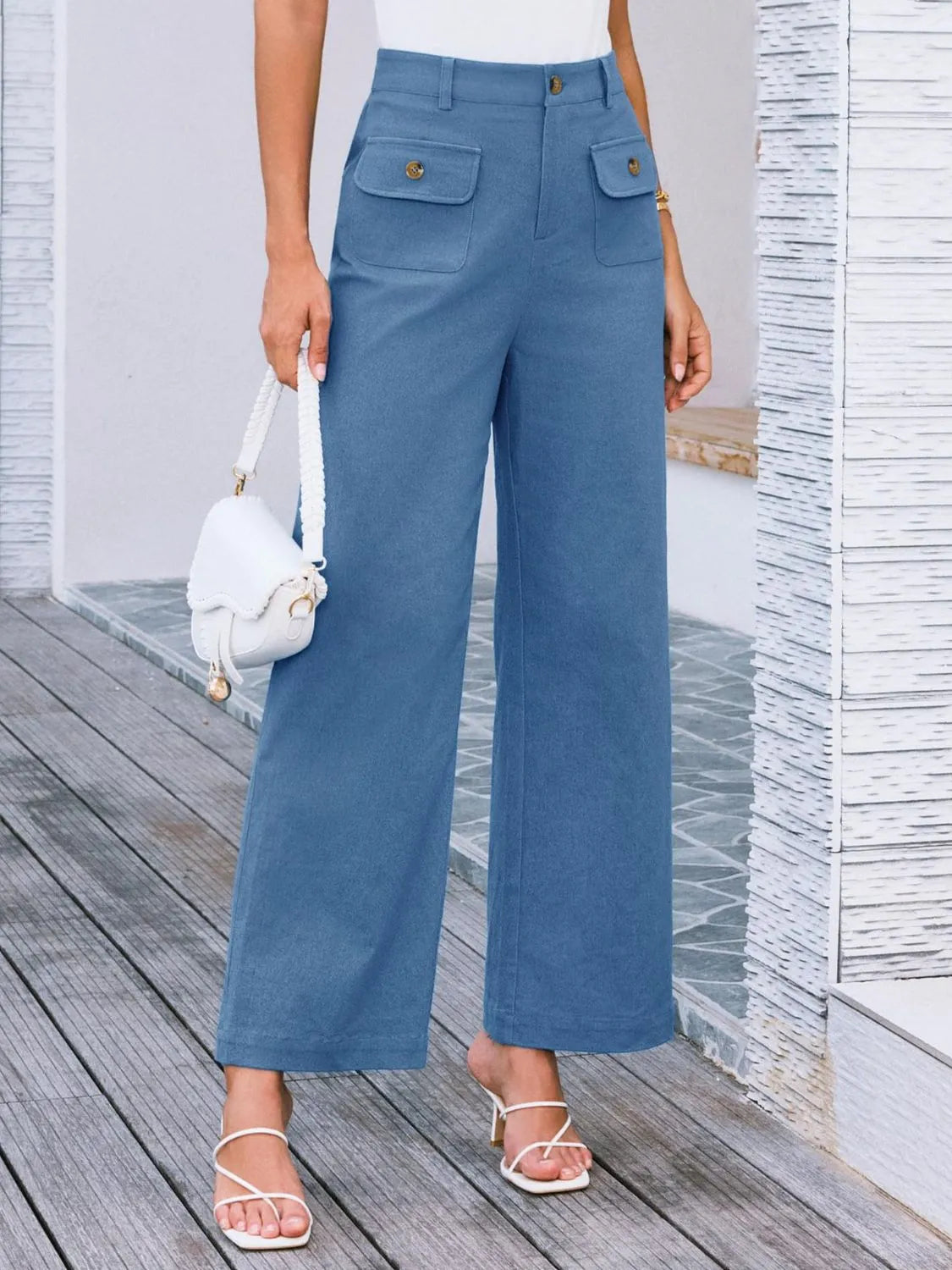 High waist wide leg pants in sky blue with front button and two flap pockets