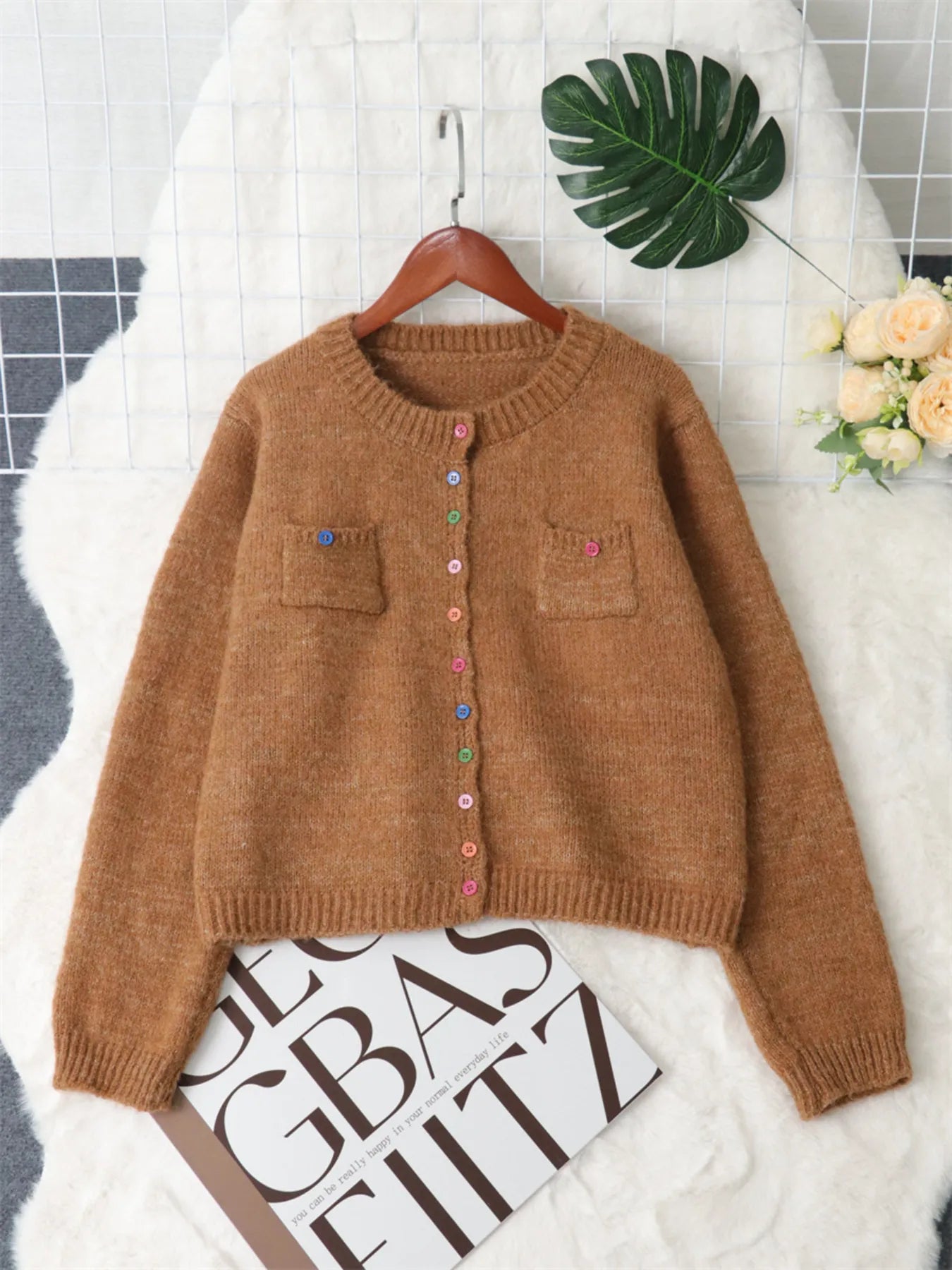 Brown button-up ribbed hem cardigan with chest pockets and multicolor button front