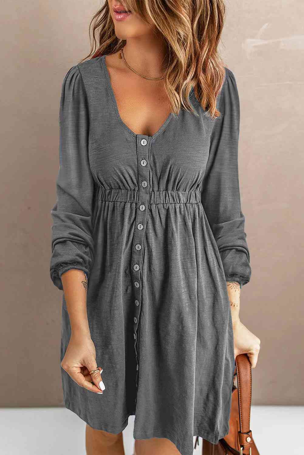 Gray long sleeve mini dress with scoop neck, button front, and gathered empire waist