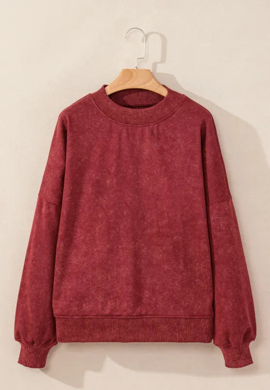 Deep red mock-neck sweatshirt on hanger with ribbed crew collar