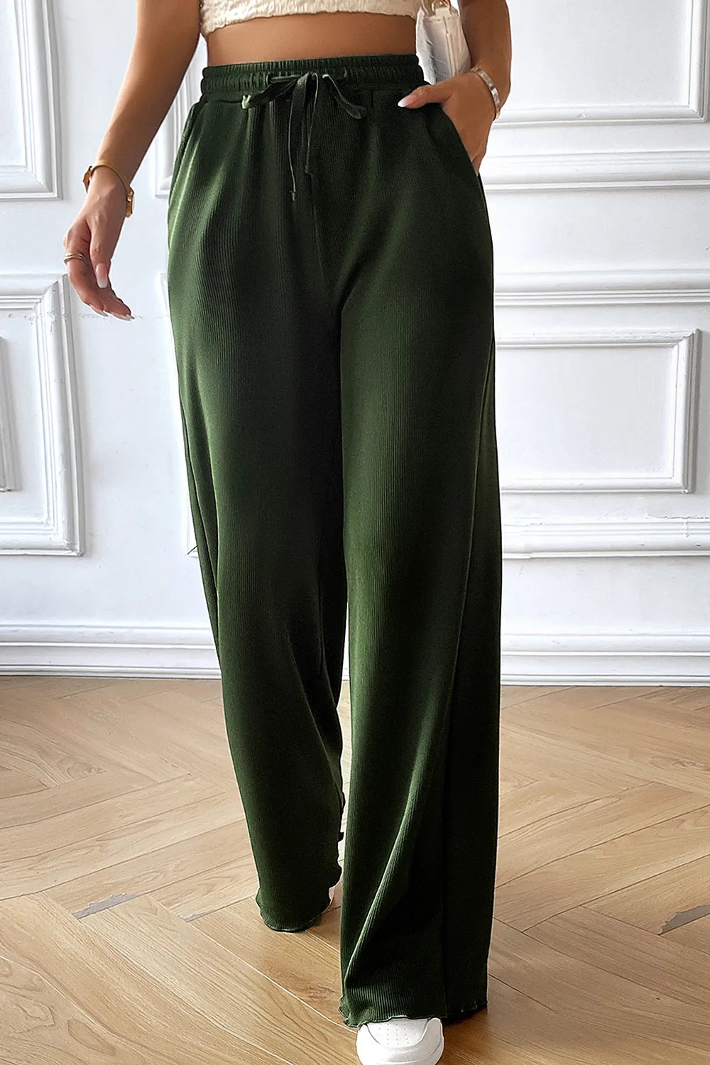 Wide-leg drawstring pants with pockets, dark green, front view with gathered waist