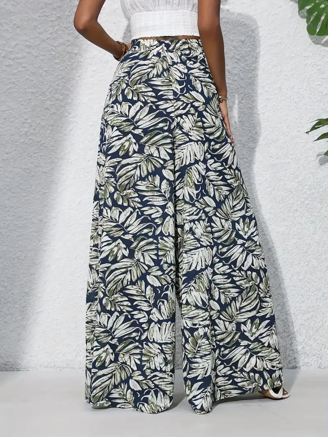 Printed high-waist wide-leg pants, navy and white leaf print, full-length wide-leg fit