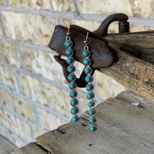 Turquoise alloy bar drop earrings with two vertical rows of oval turquoise stones