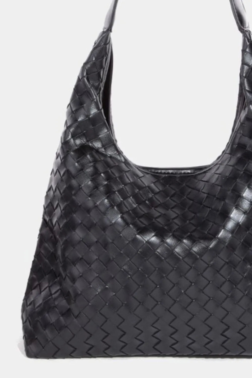 Woven faux leather tote bag close-up, wide open top with glossy dark weave