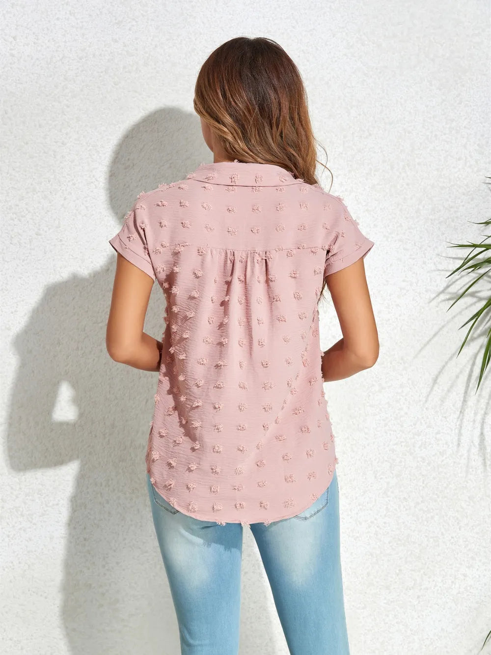 Blush pink swiss-dot cap-sleeve shirt with back yoke pleats and button placket