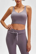 Mauve scoop-back sports bra with wide straps and smooth stretch fabric