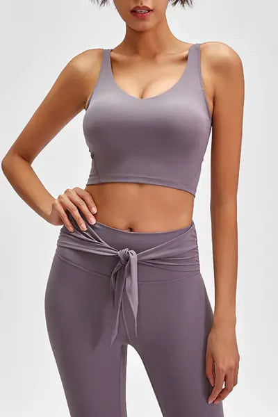 Mauve scoop-back sports bra with wide straps and smooth stretch fabric