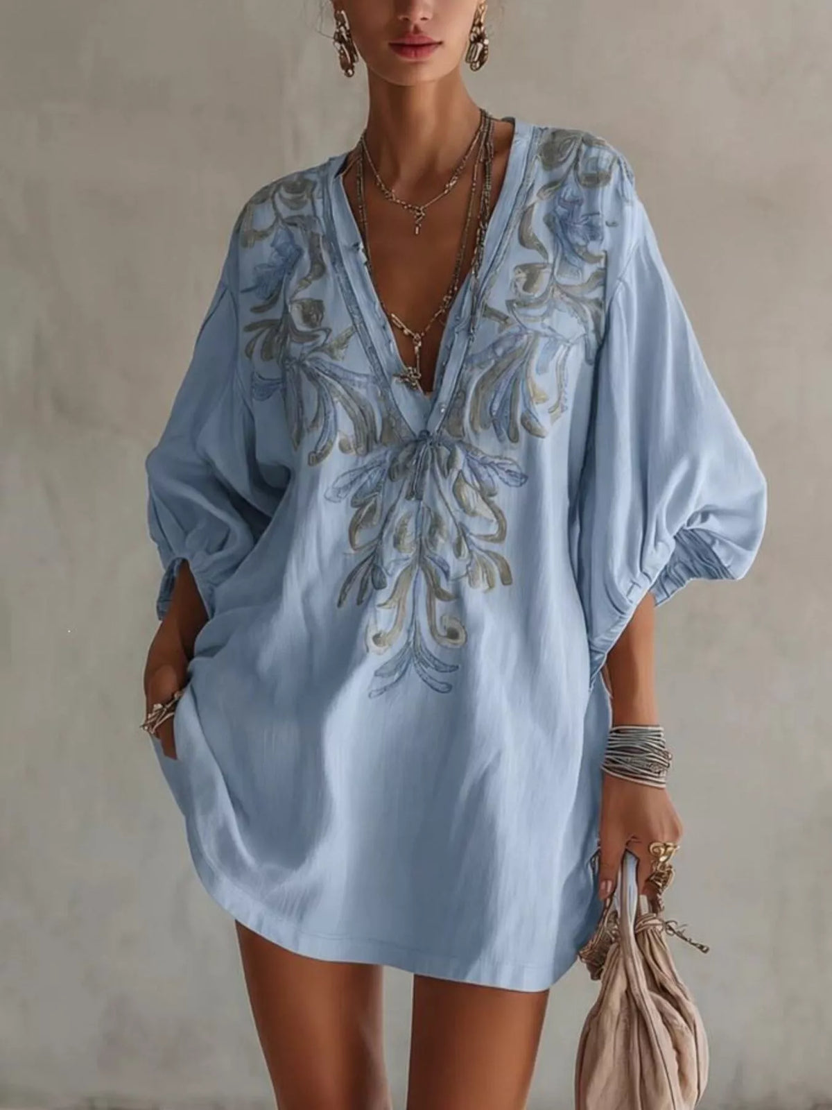 Embroidered v-neck mini dress, light blue with floral embroidery and puff sleeves