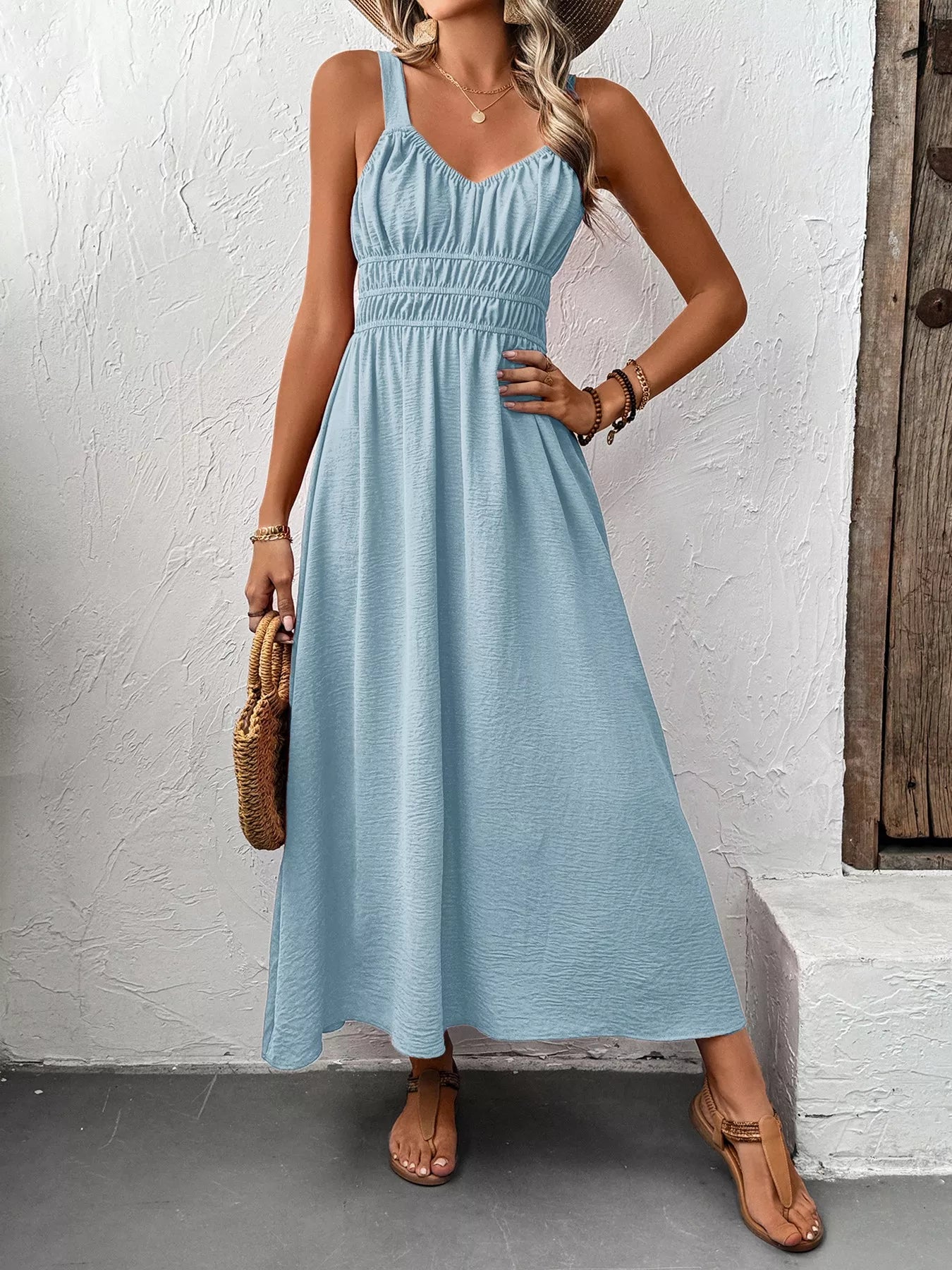 Cedar & Moore Sleeveless Smocked Casual Midi Dress in light blue by Trendsi.
