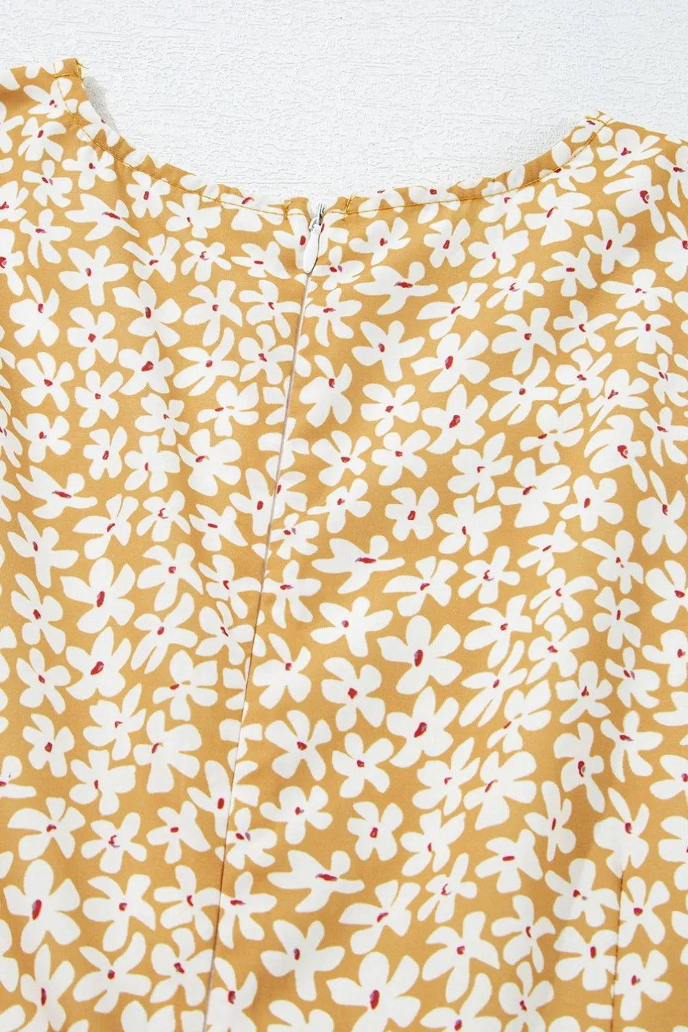 Floral yellow mini dress with white flowers, back zipper