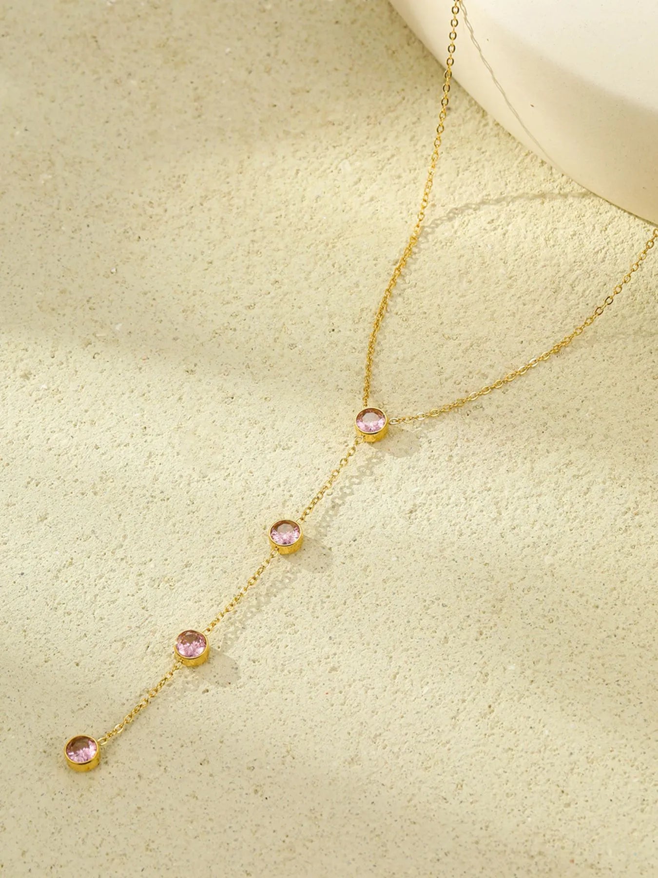 Gold-plated zircon Y-drop necklace with three pink round stones