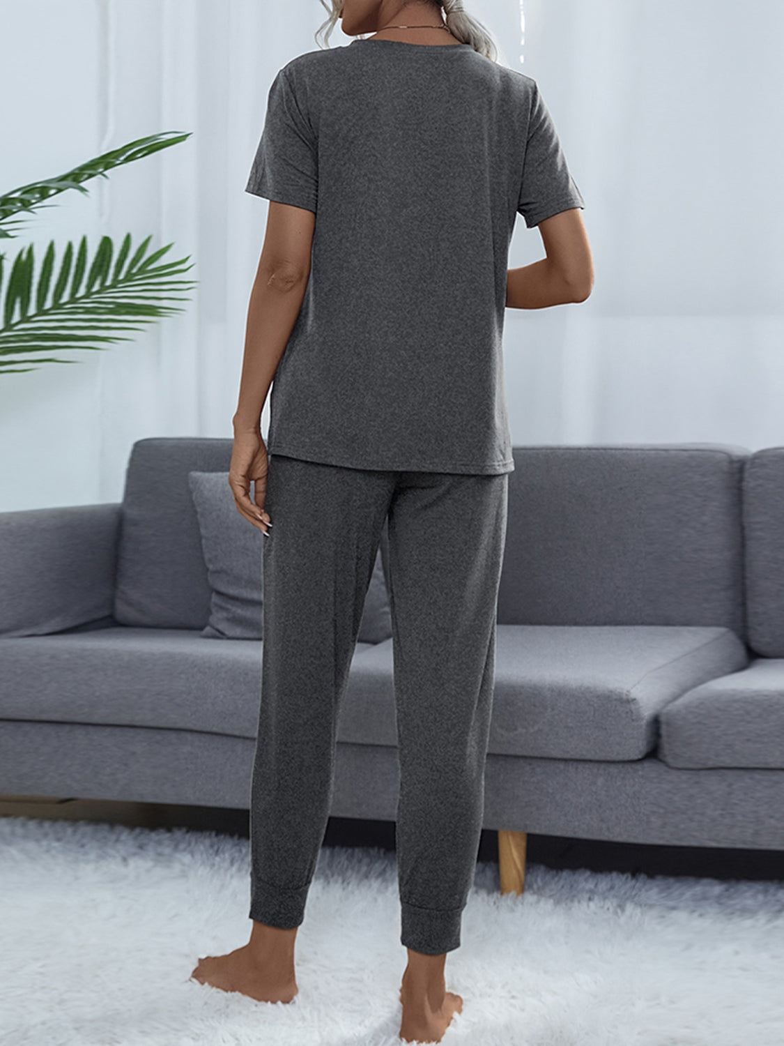 Charcoal round-neck short-sleeve top and jogger pants set, back view, drawstring waist