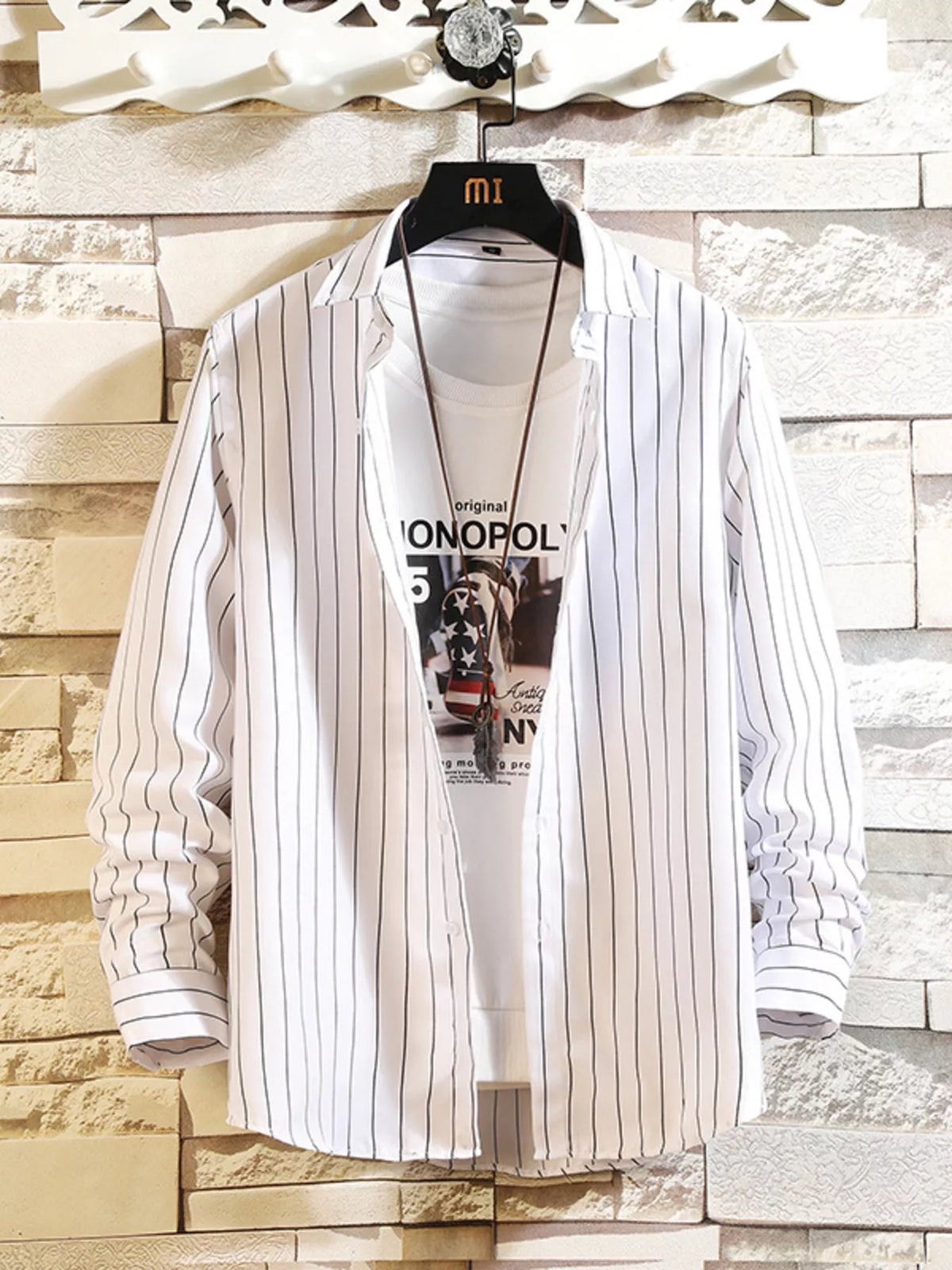 Men's striped casual button-up shirt in white with dark vertical stripes