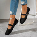 Black suede square-toe slip-on flats with ankle strap and metal buckle