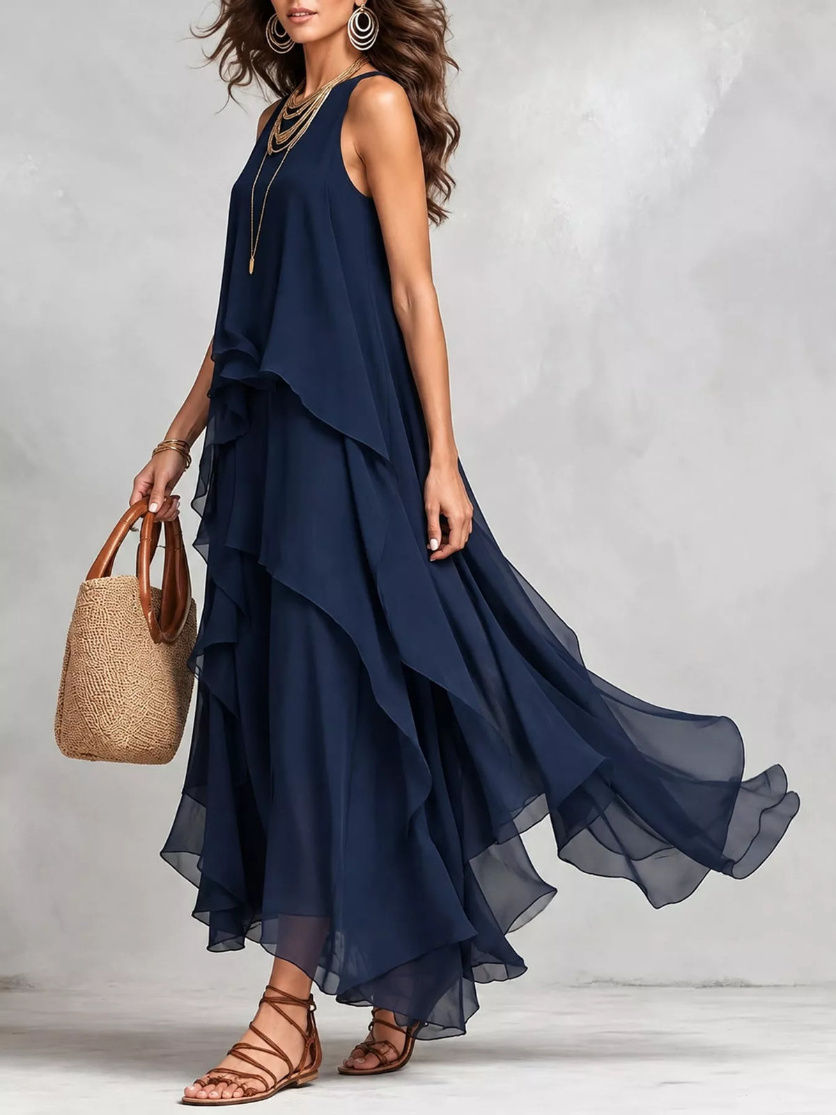 Navy sleeveless round-neck maxi dress with flowing tiered ruffles, side view