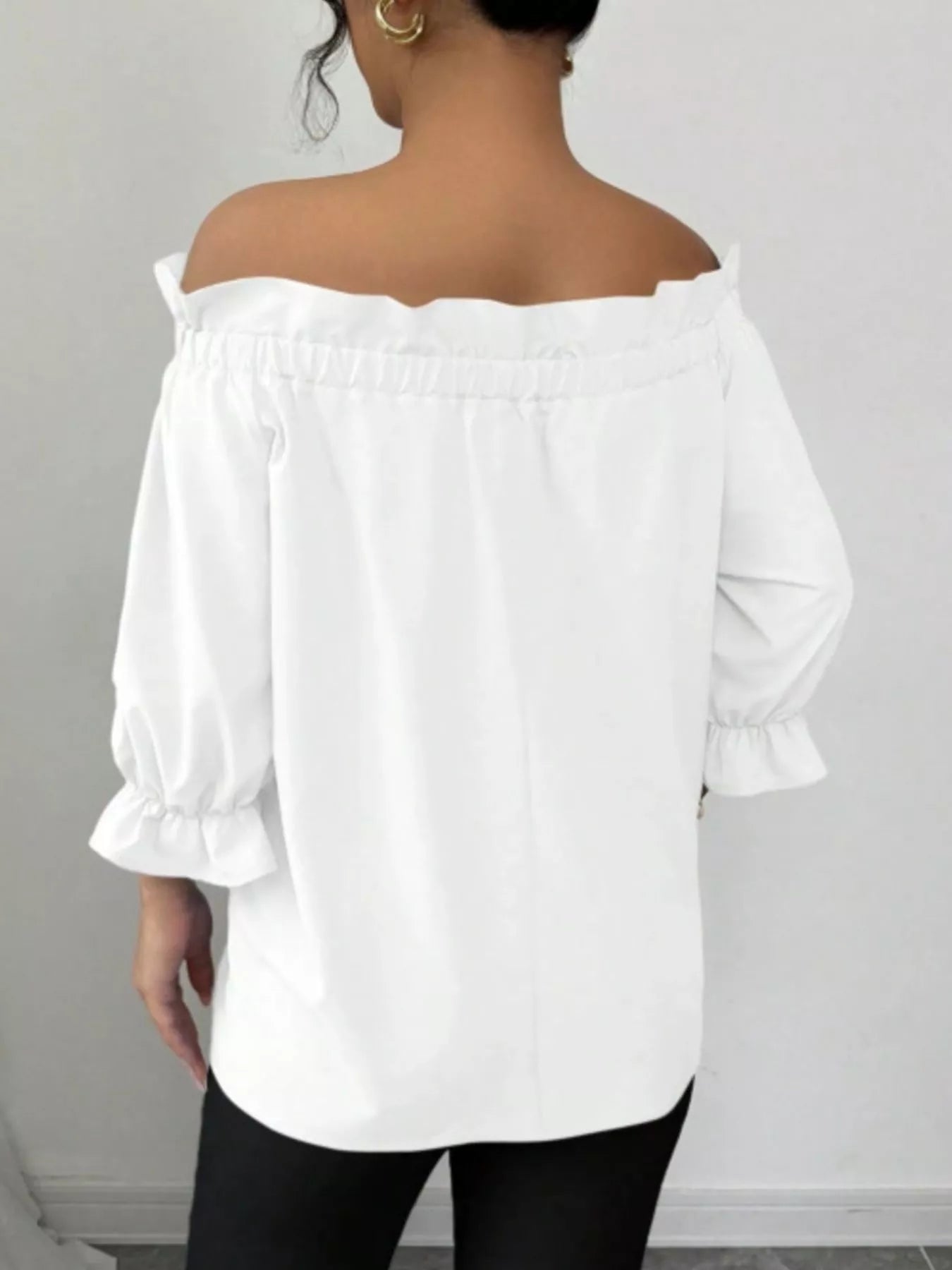 Bow Flounce Sleeve Blouse in white by Trendsi, off-shoulder style with ruffle detailing.