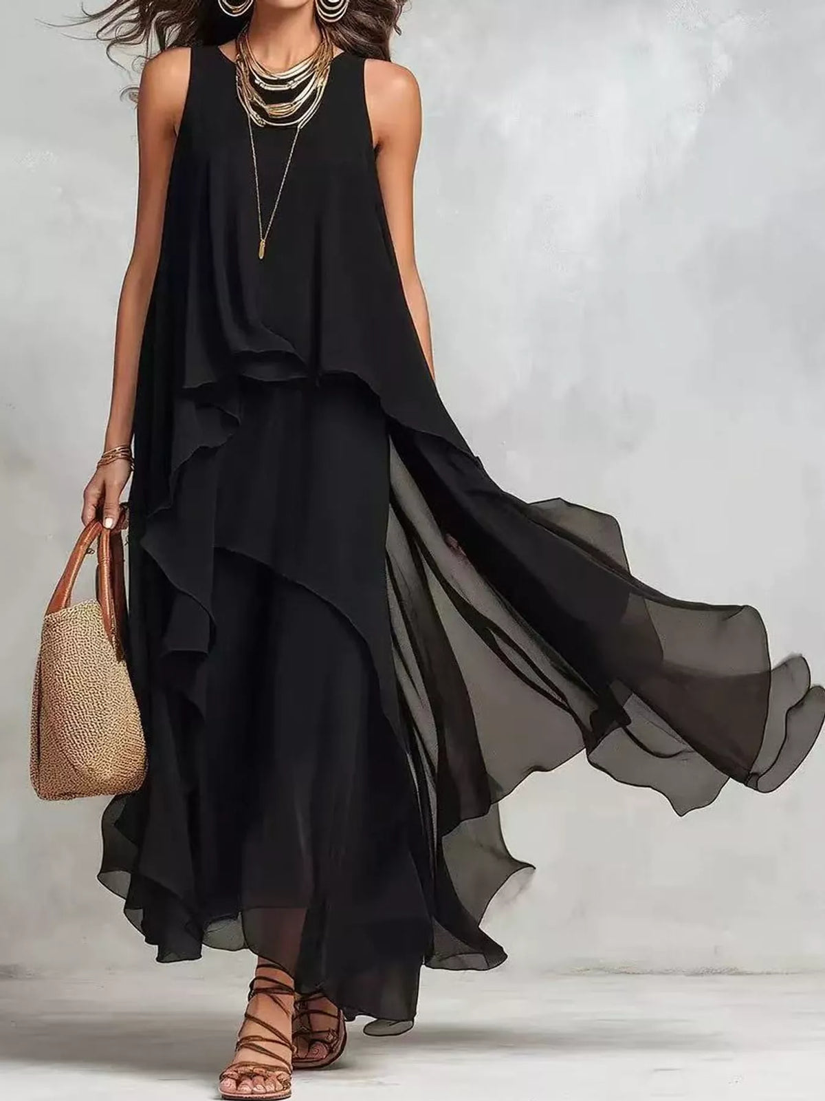 Black sleeveless ruffled round-neck maxi dress with tiered flowing chiffon layers