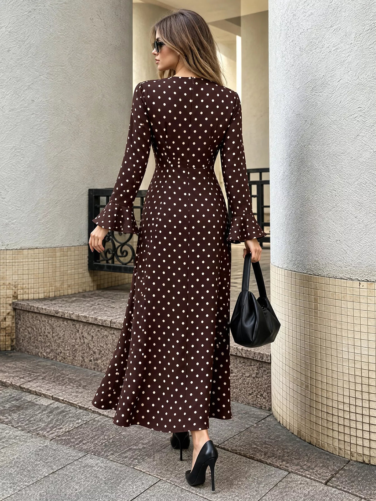 Coffee brown polka dot long-sleeve maxi dress, back view with center seam