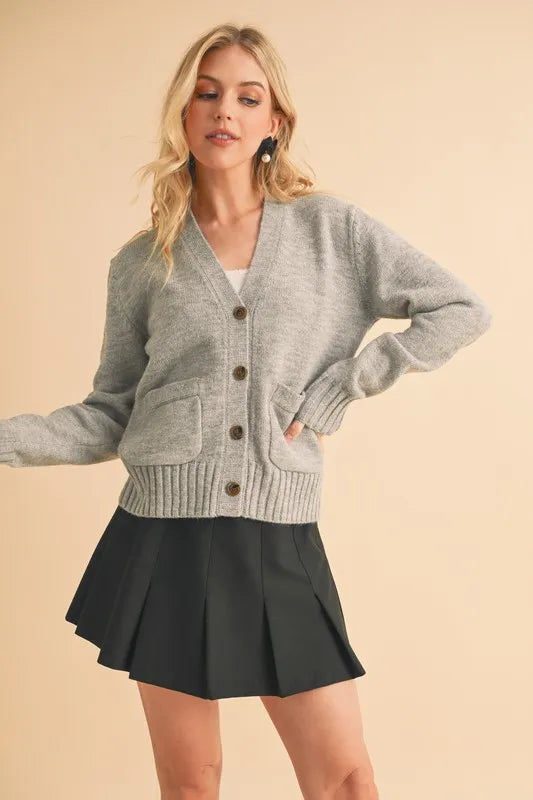 Gray ribbed hem V-neck button cardigan with front buttons and two patch pockets