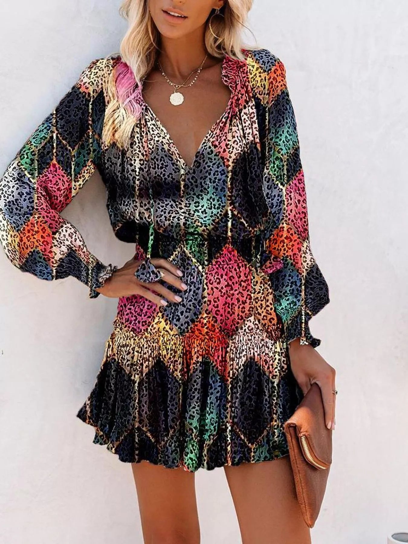 Tie-neck lantern sleeve dress in multicolor leopard print with tiered skirt
